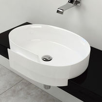 Vasque semi-encastrée / ovale / en céramique...