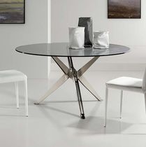 Table contemporaine / en verre / en acier...