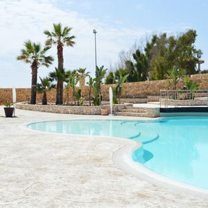 revêtement de sol imprimé / en béton / pour le tertiaire / en dalles