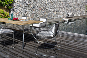 table à manger contemporaine / en teck / en HPL / en acier inoxydable