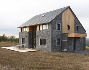 maison préfabriquée / passive / en bois massif empilé / contemporaine