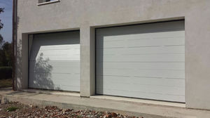 porte de garage sectionnelle / en métal / en mousse de polyuréthane / automatique