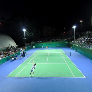 revêtement de sol en synthétique / pour terrain de tennis / en rouleau / aspect béton