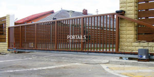 portails coulissants / en acier / à barreaux / industriels