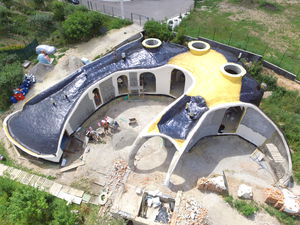 maison individuelle / design original / en béton / écologique