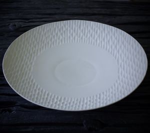 assiette à dîner / de présentation / ronde / en porcelaine de Limoges