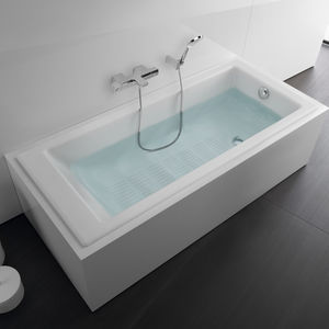 baignoire à poser / en fonte