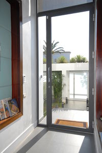 porte d'entrée / battante / en aluminium / vitrée