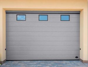 porte de garage sectionnelle / en acier / automatique