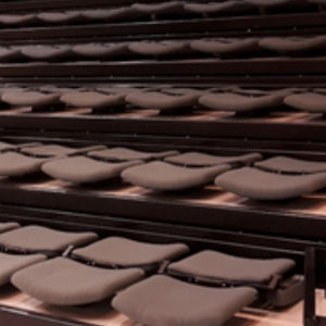 gradins avec fauteuil escamotable
