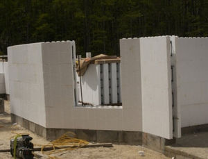 bloc de coffrage en polystyrène / pour mur / isolant / d'angle