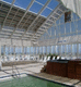 abri de piscine haut &agrave; ouverture lat&eacute;rale