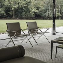 Fauteuil contemporain / en cuir / en fonte...