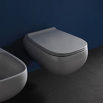 WC suspendu / en céramique / ovale / avec...
