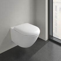 WC suspendu / en céramique / sans bride...