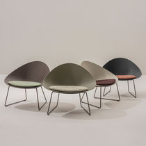 Fauteuil en cuir / en tissu / en acier chromé...
