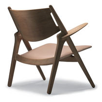 Fauteuil contemporain / en cuir / par Hans...