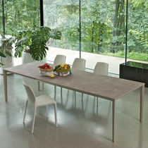 Table contemporaine / en métal / en stratifié...
