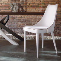 Chaise contemporaine / en tissu / en cuir...