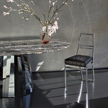 Chaise contemporaine / en tissu / en cuir...