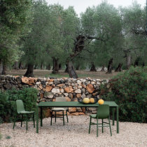 Table contemporaine / en acier / avec piètement...