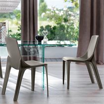 Chaise contemporaine / tapissée / en cuir...