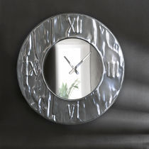 Horloge contemporaine / analogique / murale...