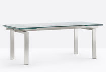 Table contemporaine / en verre / avec piètement...