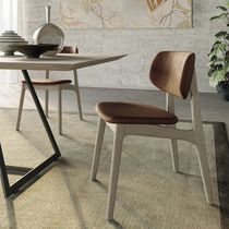 Chaise contemporaine / en tissu / en cuir...