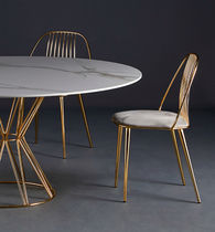 Chaise contemporaine / tapissée / piètement...