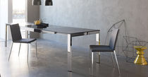 Table contemporaine / en métal / rectangulaire...