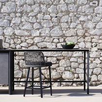 Table contemporaine / en pierre / en céramique...