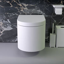 WC suspendu / en céramique / sans bride