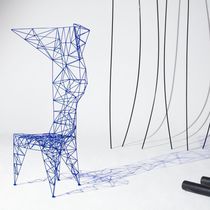 Chaise design original / en métal / à dossier...