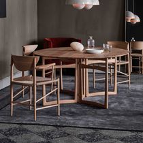 Table contemporaine / en bois massif / avec...