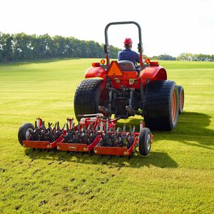 scarificateur monté sur tracteur
