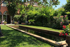 piscine enterrée / en bois / couloir de nage / sur mesure