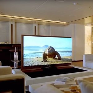 système de levage pour TV à base rotative