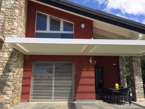 pergola suspendue / en aluminium extrudé / à lames orientables / à lames brise soleil