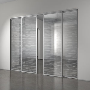 système à galandage pour porte coulissante en verre 1