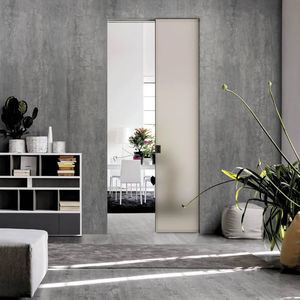 système à galandage pour porte coulissante en verre
