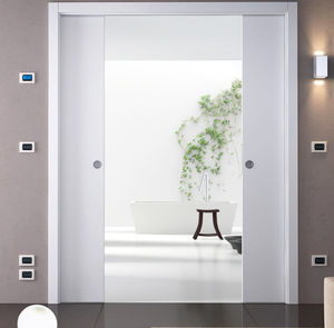 système à galandage pour porte coulissante 1