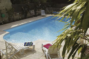 piscine en blocs à bancher en polymère / enterrée / en béton / d'extérieur