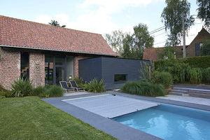 piscine enterrée / en béton / avec couverture intégrée / d'extérieur