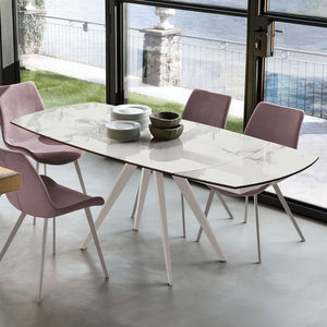 table à manger contemporaine / en verre trempé / en grès cérame / avec piètement en métal peint