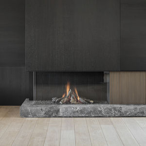 cheminée à gaz / contemporaine / à foyer fermé / d'angle