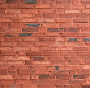 bardage en briques / en terracotta / texturé / rouge