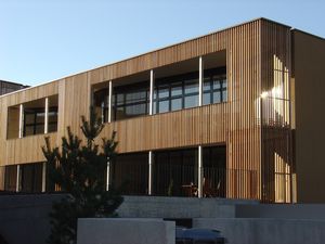 bardage en panneaux / en bois / rainuré