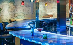 comptoir de bar / en verre / en arc de cercle / lumineux