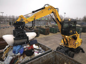 pelle hydraulique sur pneus